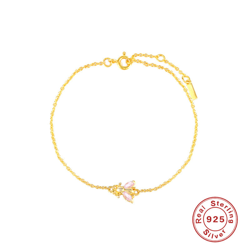 Feines Armband mit gefärbten Bienchen