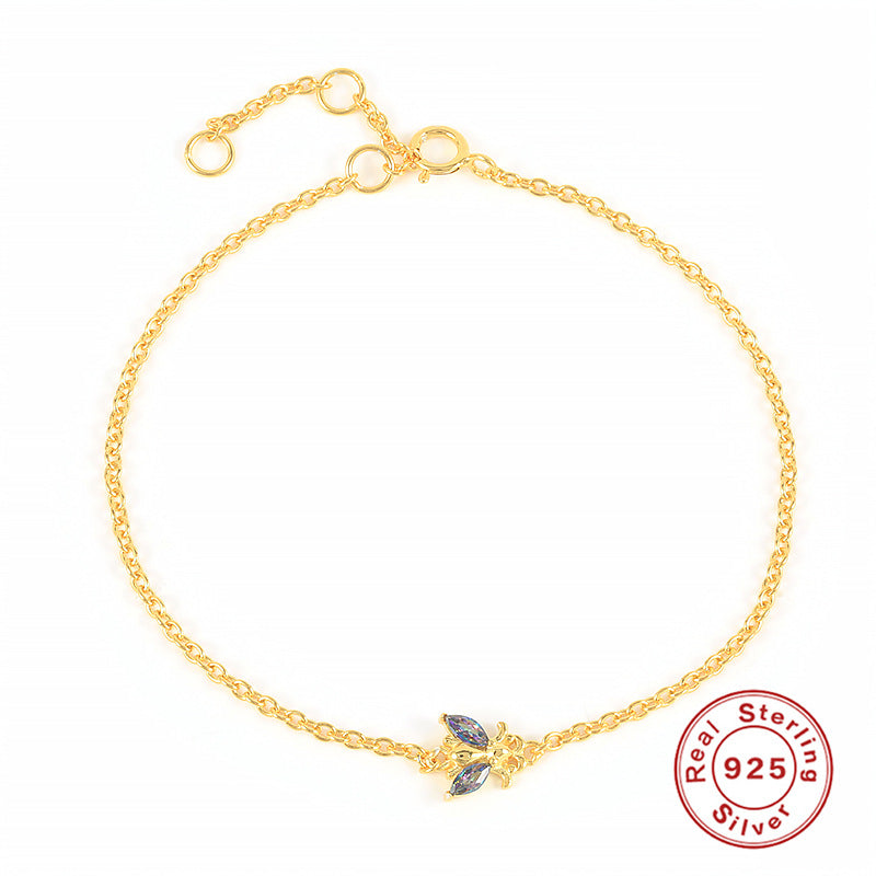 Feines Armband mit gefärbten Bienchen